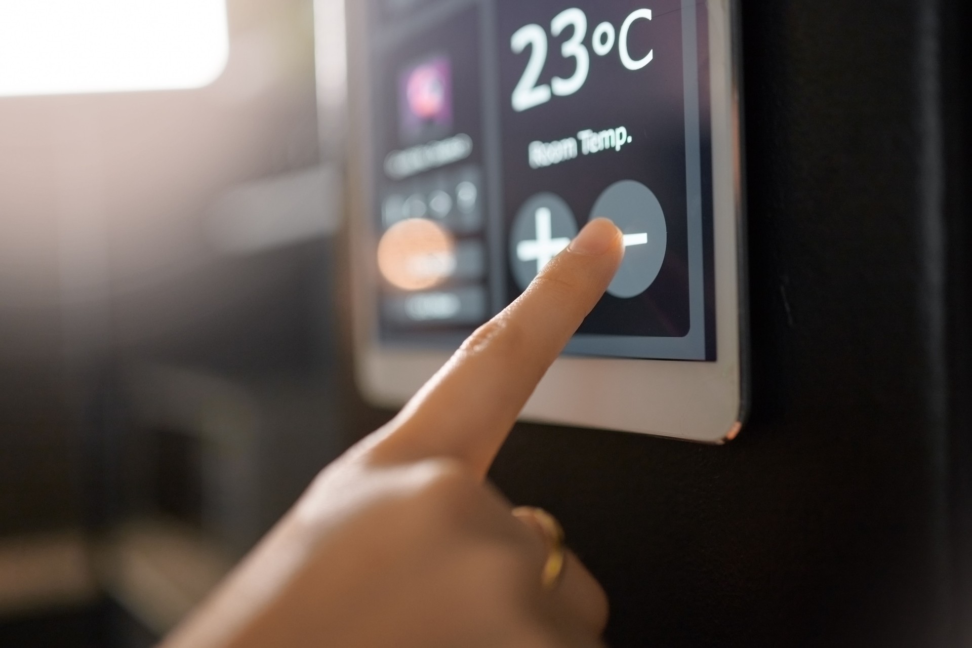 Smart home system, wall and woman hands with digital app monitor for thermostat heating, temperature control or house automation. Future AI software, ui air conditioning panel and girl with IOT tech